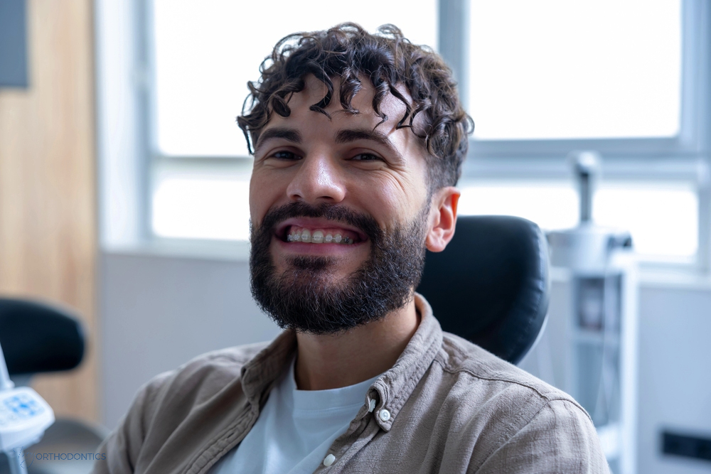 a man smiling with clear braces, one of the alternatives to braces in little falls, NJ